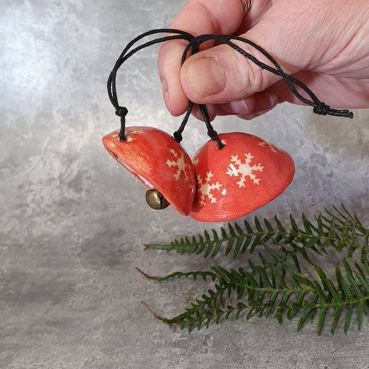 Handmade rustic ceramic Christmas bell decoration
