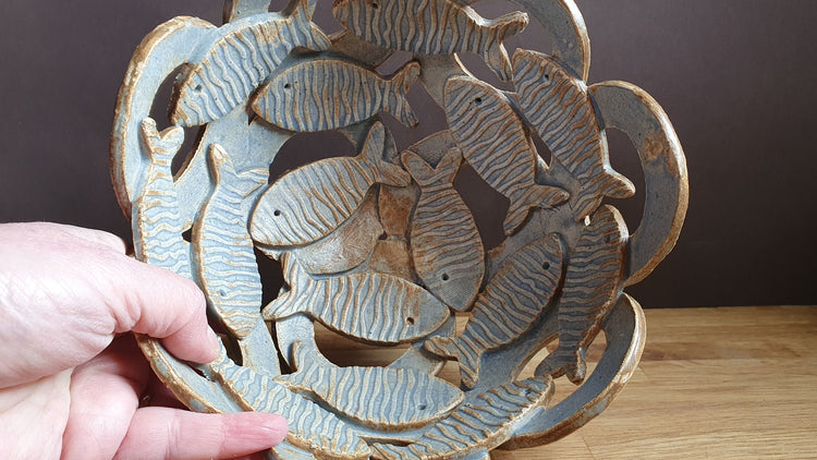 Decorative bowl and ceramic spoon image