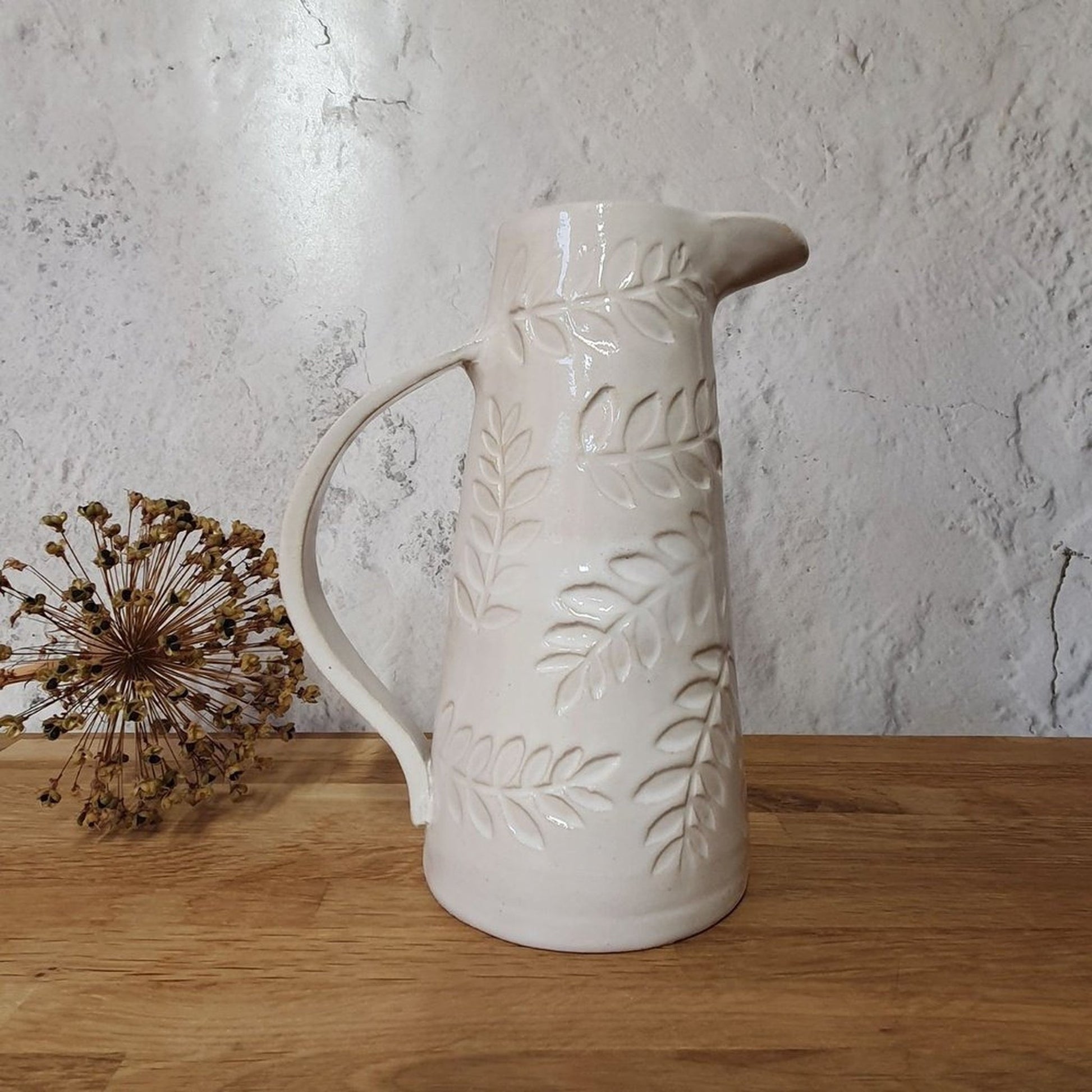 Handmade stoneware pitcher jug white leaves _image