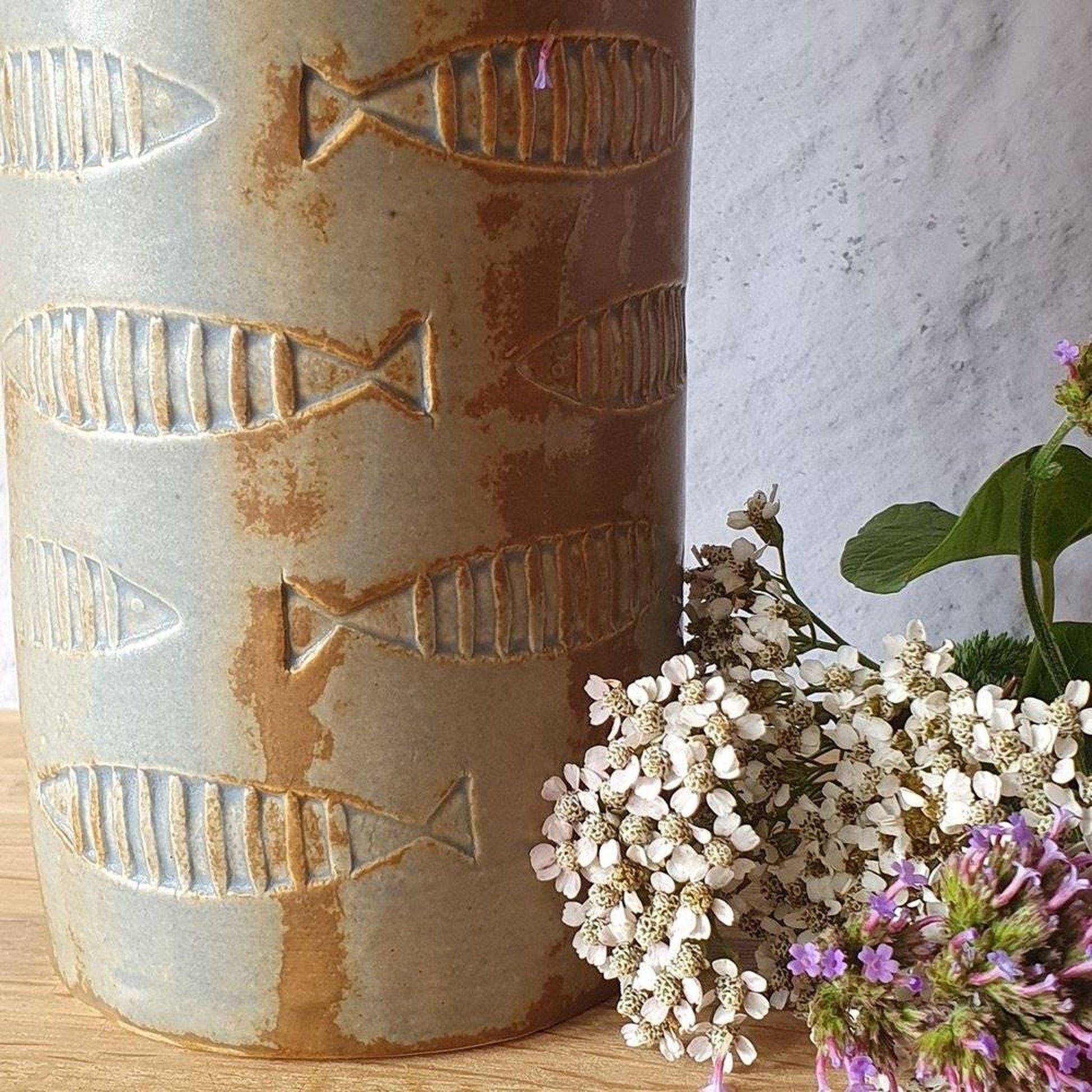 Handmade ceramic tall jar with lid with fish pattern _image