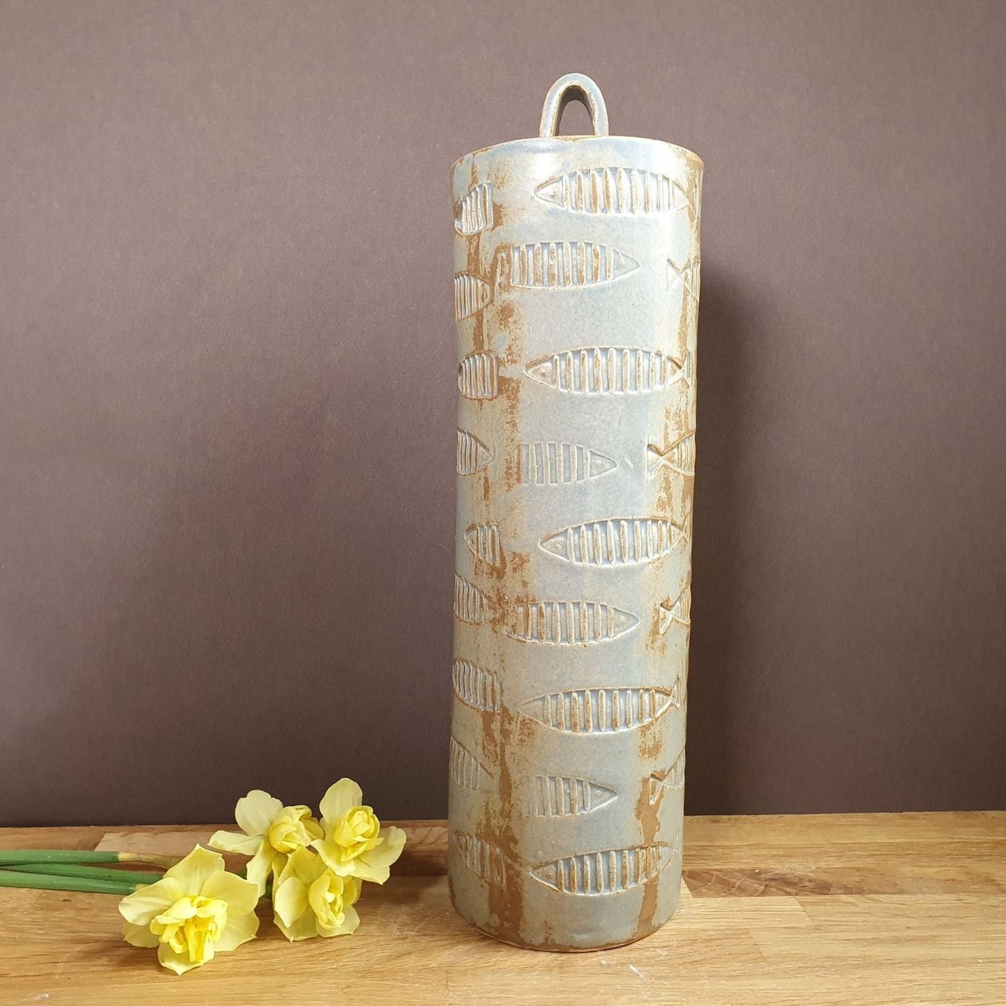 Storage jar with fish motif 27cm handmade stoneware
