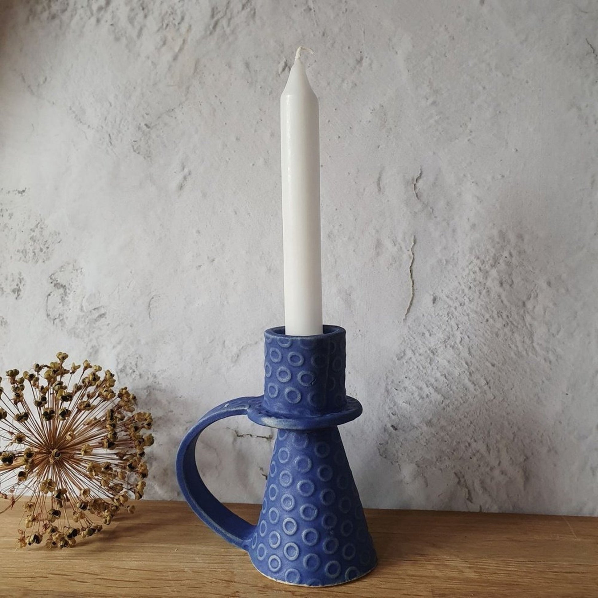 Candle holder in vibrant blue _image