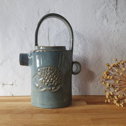 Decorative pourer with hedgehog design _image