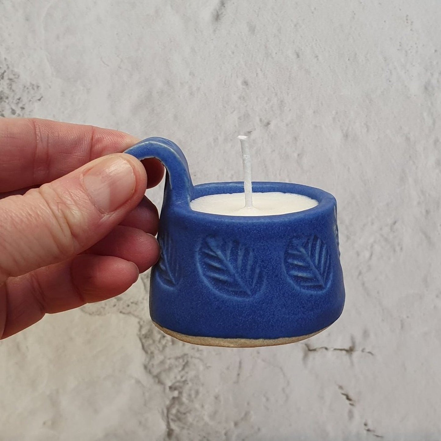 Soy wax tealight in cobalt blue stoneware pottery _image
